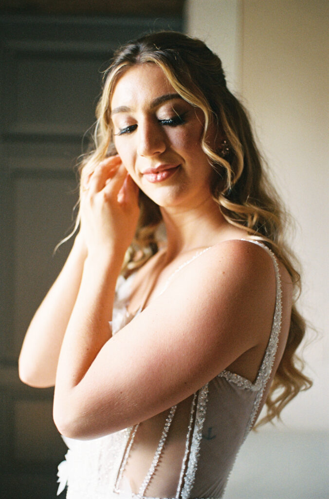 bride wearing Tom Sébastien wedding gown; lace bodice wedding dress