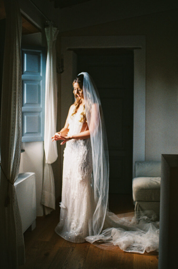 bride wearing Tom Sébastien wedding gown; lace bodice wedding dress