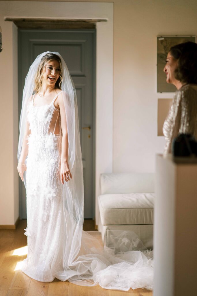 bride wearing Tom Sébastien wedding gown; lace bodice wedding dress