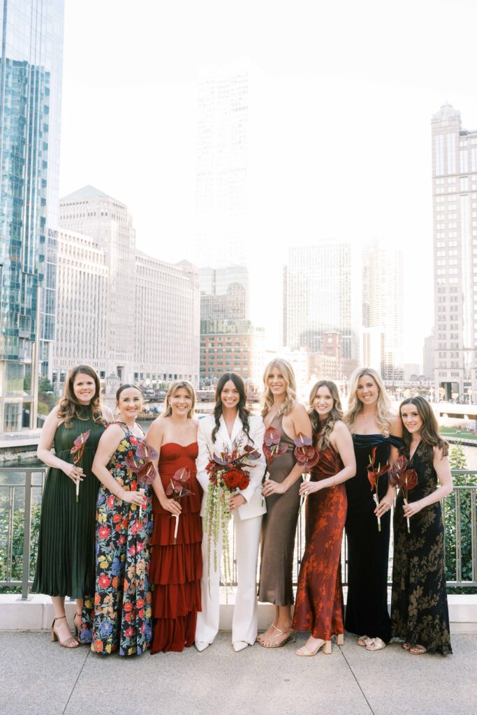 Bridal party wearing mix-and-match dresses at modern wedding