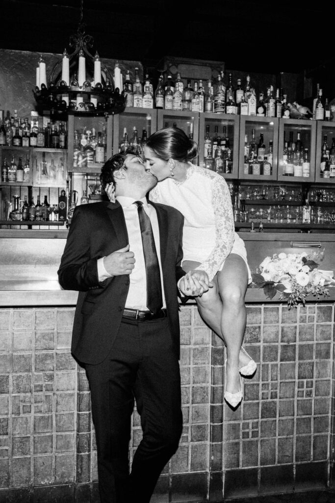 black and white direct flash wedding photos at Chicago Athletic Association bar