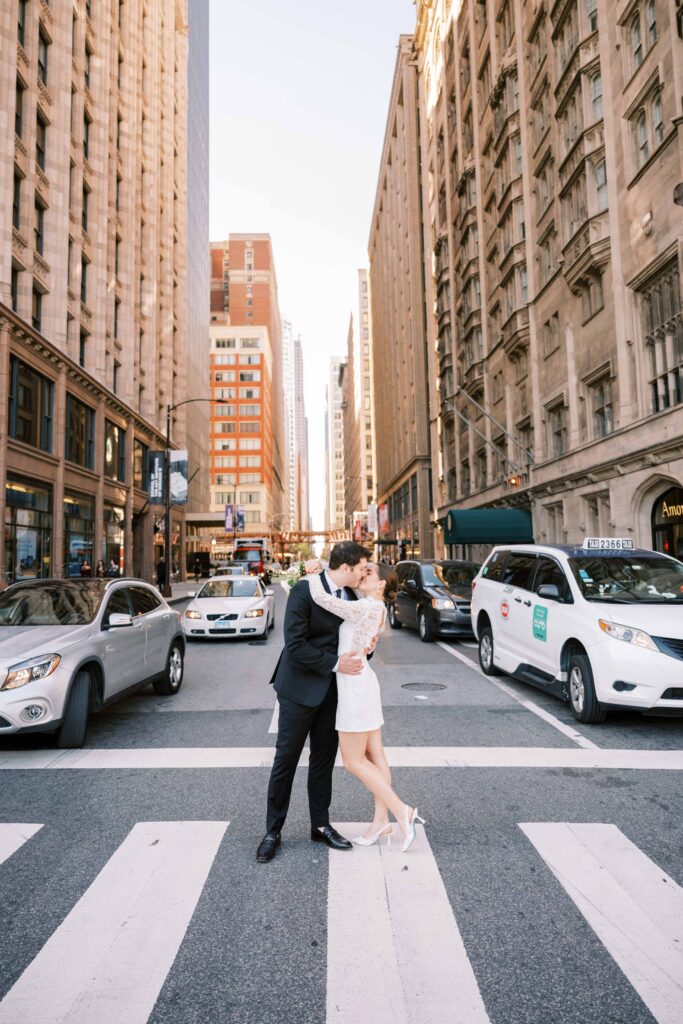 city crosswalk kiss wedding photos