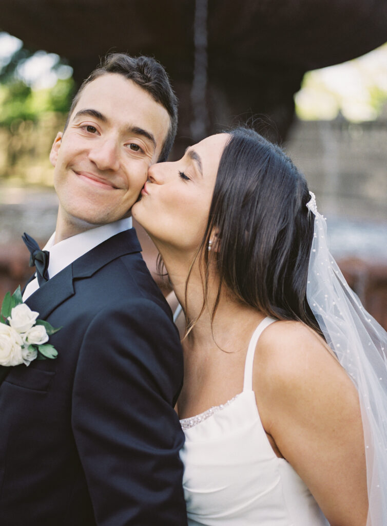 cute photos of bride kissing groom