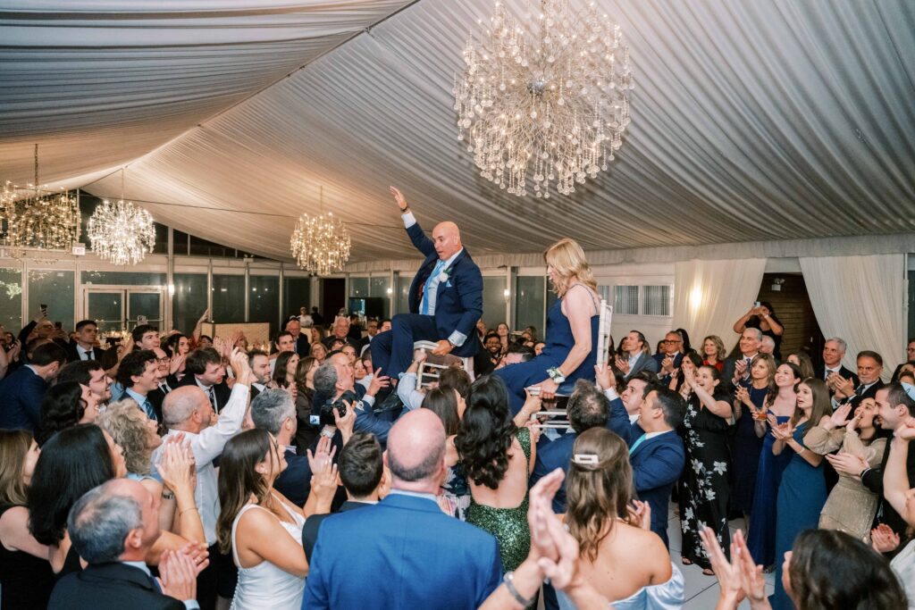 dancing the hora at a Jewish wedding