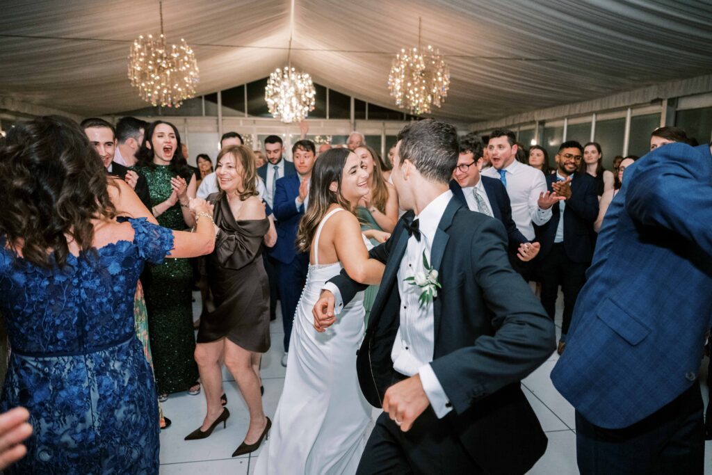 dancing the hora at a Jewish wedding