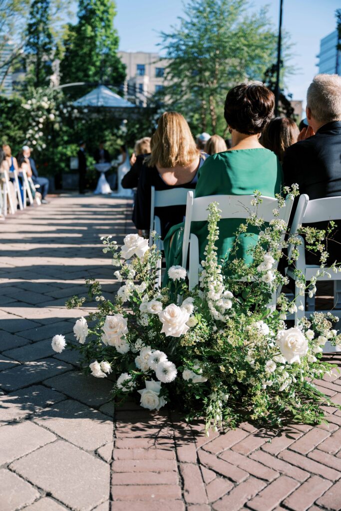 wedding ceremony ground floral arrangements