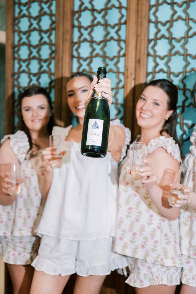 bride getting ready champagne pop