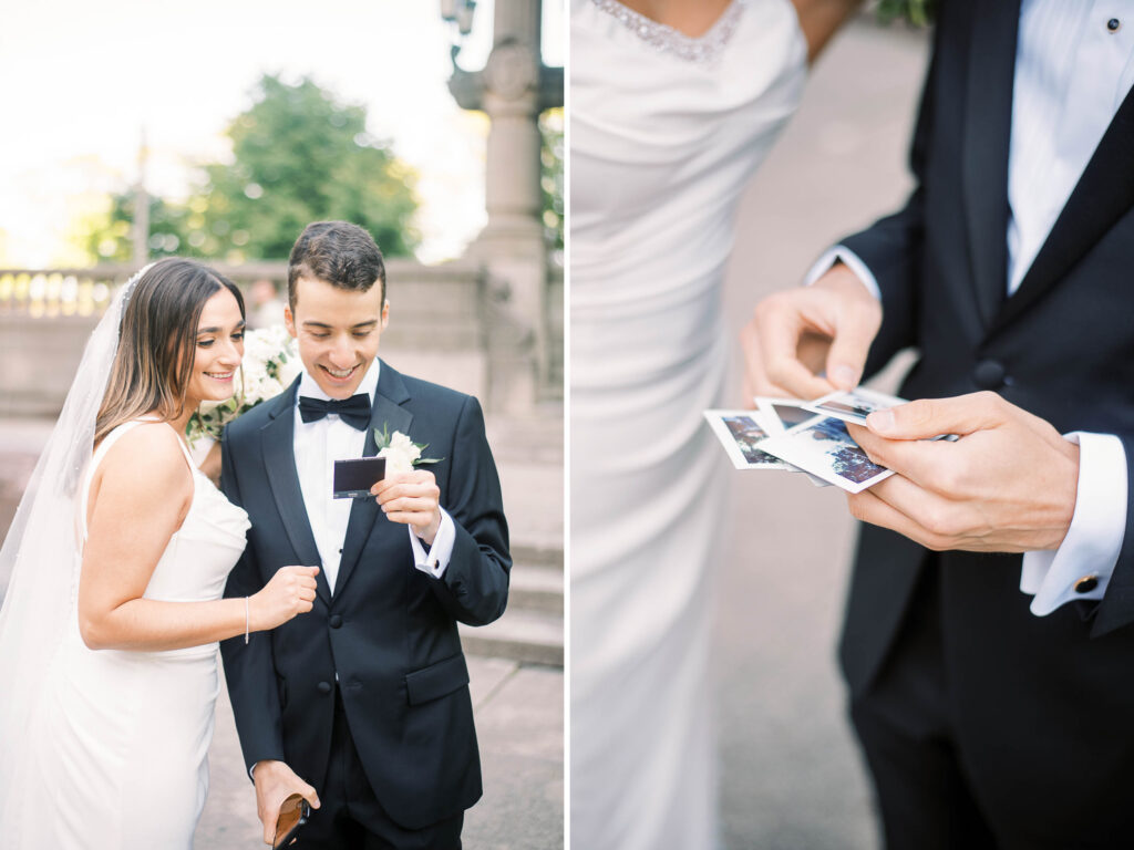 newlywed couple looking at polaroids 