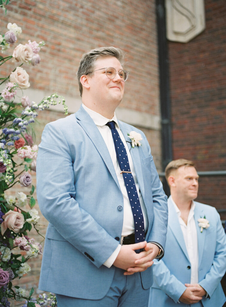 groom reaction at wedding ceremony