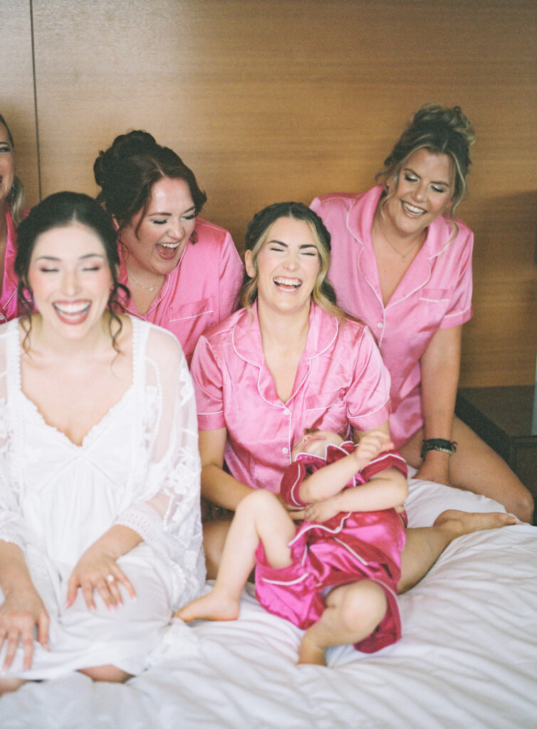bridal party photos; pink bridesmaids pajamas