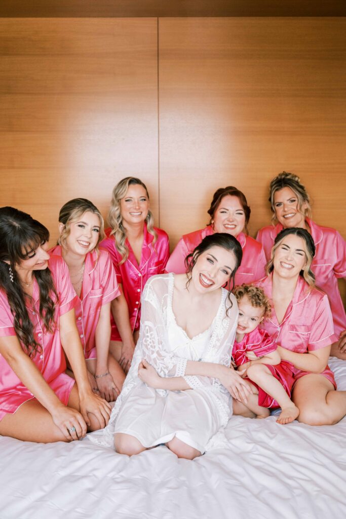 bridal party photos; pink bridesmaids pajamas