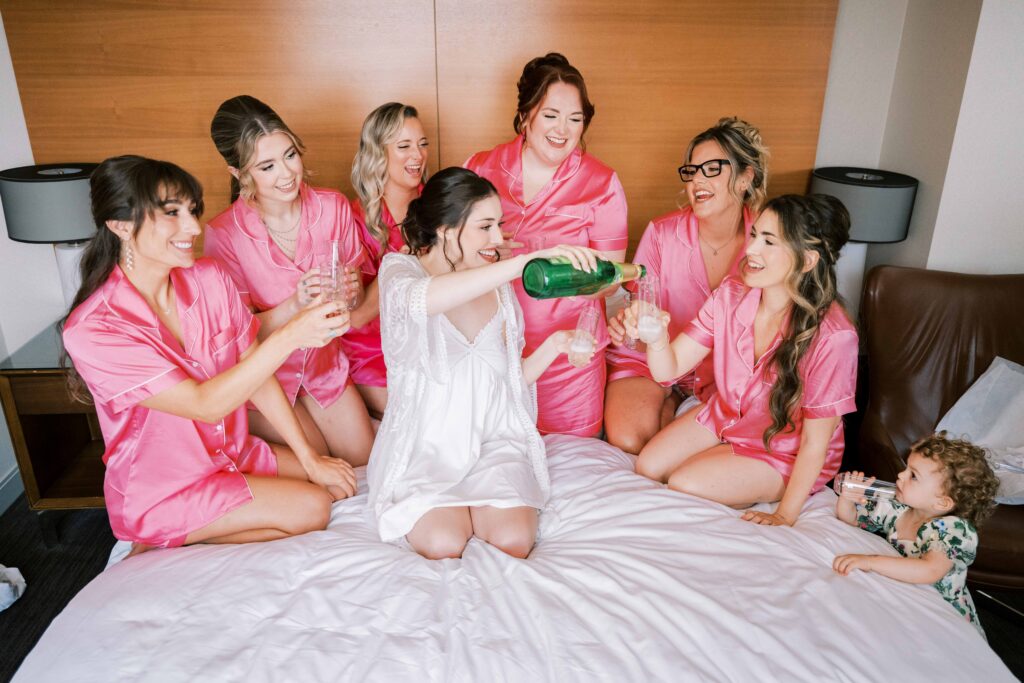 bridal party photos; pink bridesmaids pajamas