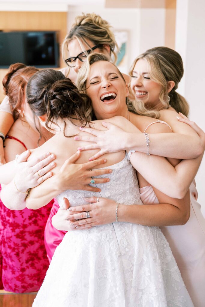 bride first look with bridesmaids