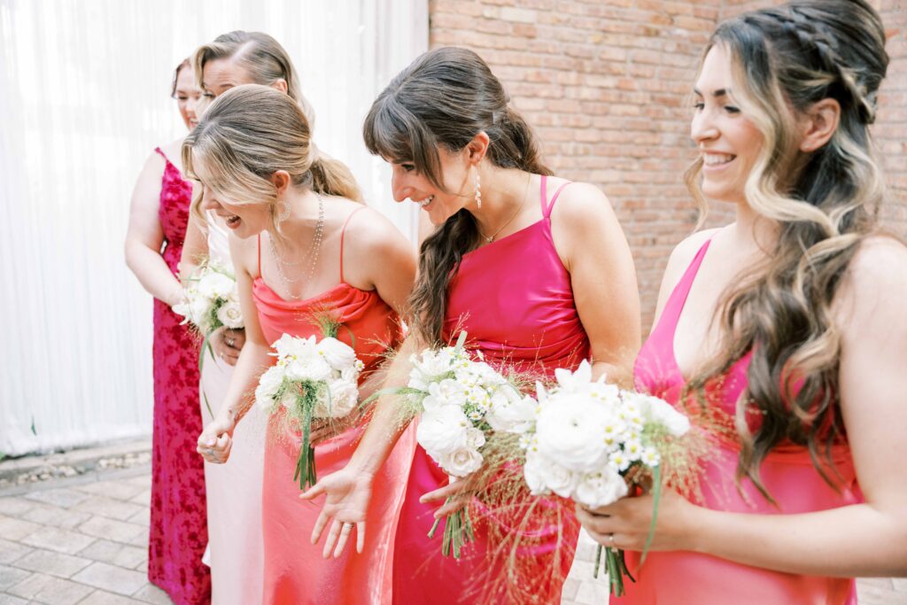 photos of bridesmaids in mix and match dresses at wedding
