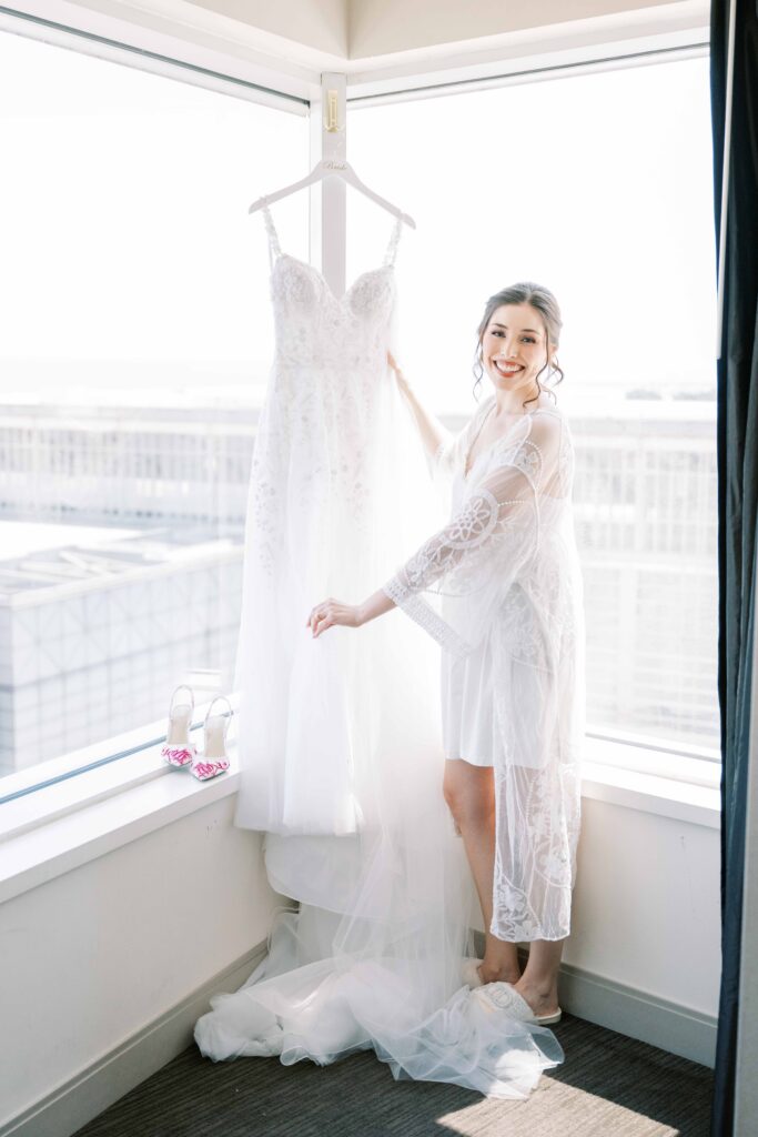 bride getting ready; photos with dress